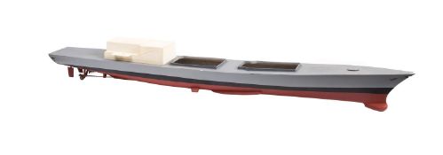 A part complete scale model of a destroyer.