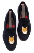 A pair of Bowhill & Elliott suede shoes.