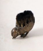 A Victorian brass nib wipe in the form of a Chick.