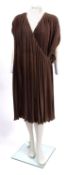 A Gianni Versace pleated evening dress.