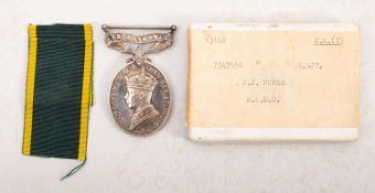 A Territorial Efficiency medal awarded to S.SJT FJ Nokes RAMC 7347556. With ribbon, in original box.