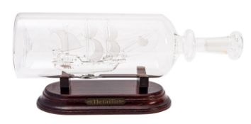 A collection of five Lichfield Glass sculptures of ships.