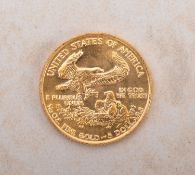 A USA 1/10 OZ fine gold five dollar coin.