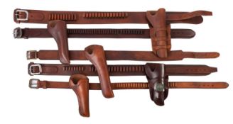 A collection of reproduction leather pistol holsters in 19th century style. Comprising Colt SA 3.