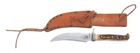 A Puma Skinner stainless steel hunting knife.