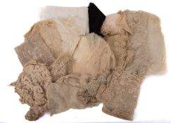A collection of late 19th/ early 20th century lace, various size panels and trim,
