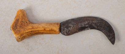An early 20th century Somerset Teasle knife.