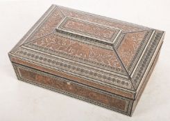 A Huntley & Palmers biscuit tin in the form of a carved Indian box,