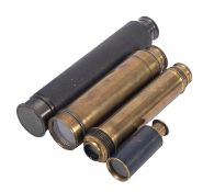 A collection of four brass telescopes.