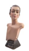 An early 20th Century Belgian Art Deco Advertising bust 'Le Collifichet Belge' .