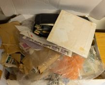 A quantity of loose stamps and FDCs.