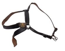 A Victorian black leather sword belt with gilt brass and white metal buckle,