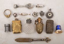 A collection of mainly white metal Stanhopes.