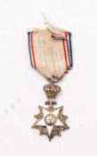 A miniature medal, possibly an Egyptian Order of The Nile.