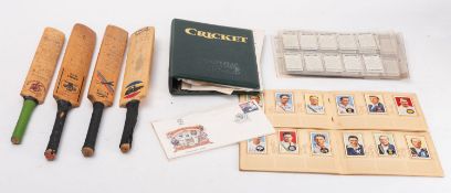 A collection of autographed Cricket bats.