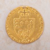 A George III 1794 Guinea coin. Circulated, ex mount, within jewellery box.