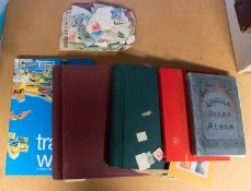 Four stamp albums a stock book and loose.