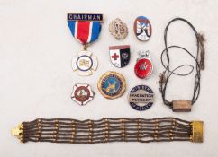 A WWII white metal ATS lapel badge; number '724',
