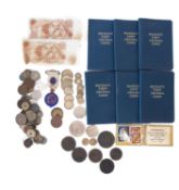 A collection of coins, including 1797 Cartwheel 2d, 1775 Evasion halfpennies, 1896 Kruger Florin,
