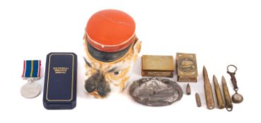 A mixed group of collectables, comprising;- two early 20th century brass matchbox holders,