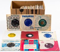 A collection of 45 RPM records. Comprising a range of genres noting Kiss, U2 and Buddy Holly etc.