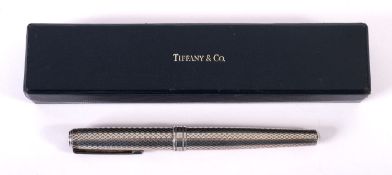 A Tiffany & Co silver fountain pen. The pen marked .