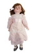 A Simon and Halbig bisque head porcelain doll.