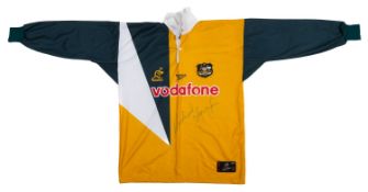 A Reebok Australian Rugby Union shirt with Vodaphone sponsor signed by Michael Lynagh.