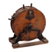 A George Kent of London oak cased knife sharpener.