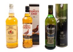 Three bottles of Scotch Whisky.