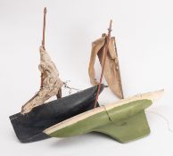 Two early 20th century wooden pond yachts.