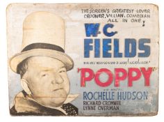An early 20th cinema advertising board for W.