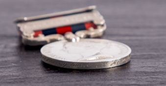 A Victorian India general Service medal with two clasps ' 711 Pte James Henry Cook 1st Hampshire