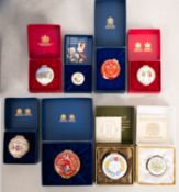 A collection of five Halcyon Days enamel boxes.