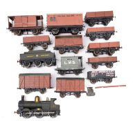 A collection of O gauge rolling stock.
