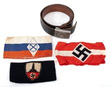 A German army belt and three armbands.