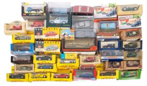 A mixed collection of diecast cars.