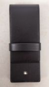 A Montblanc Leather pen case. Serial number 02/010, in black and sold in original box.