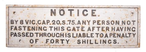 A BR cast iron Penalty Notice for gate fastening, 25x79cm over painted silver.