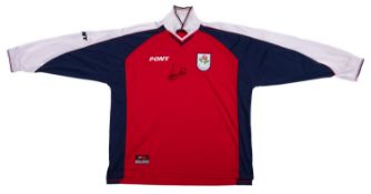 Wasim Akram , a signed Lancashire cricket team shirt.