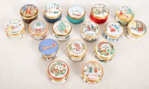 A collection of Halcyon Days Christmas enamel boxes, from 1974 to 1989, all unboxed.
