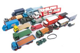 A mixed collection of diecast trucks and lorries.
