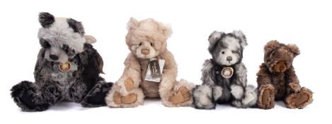 A collection of four Charlie Bear teddy bears.