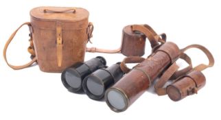 Two early 20th century optical instruments.