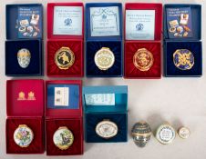 A collection of Halcyon Days enamel boxes,including;- A token of Affection,