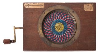 A John Browning of London chromotrope magic lantern slide.