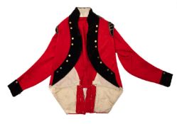 A late 18th/early 19th century red wool tunic with black facings and plain gilt button,