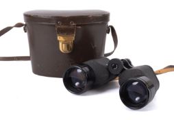 A pair of Carl Zeiss 10x50 binoculars. Serial number 617374, in black with brown leather case.