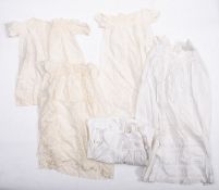 A collection of christening gowns.