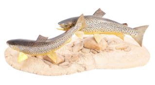 A ceramic fish sculpture by Ian J Greensitt,